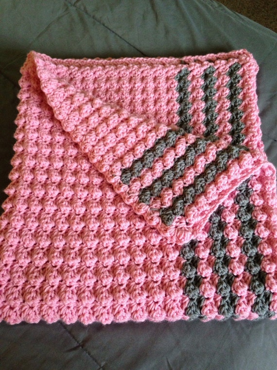 Crocheted pink baby blanket