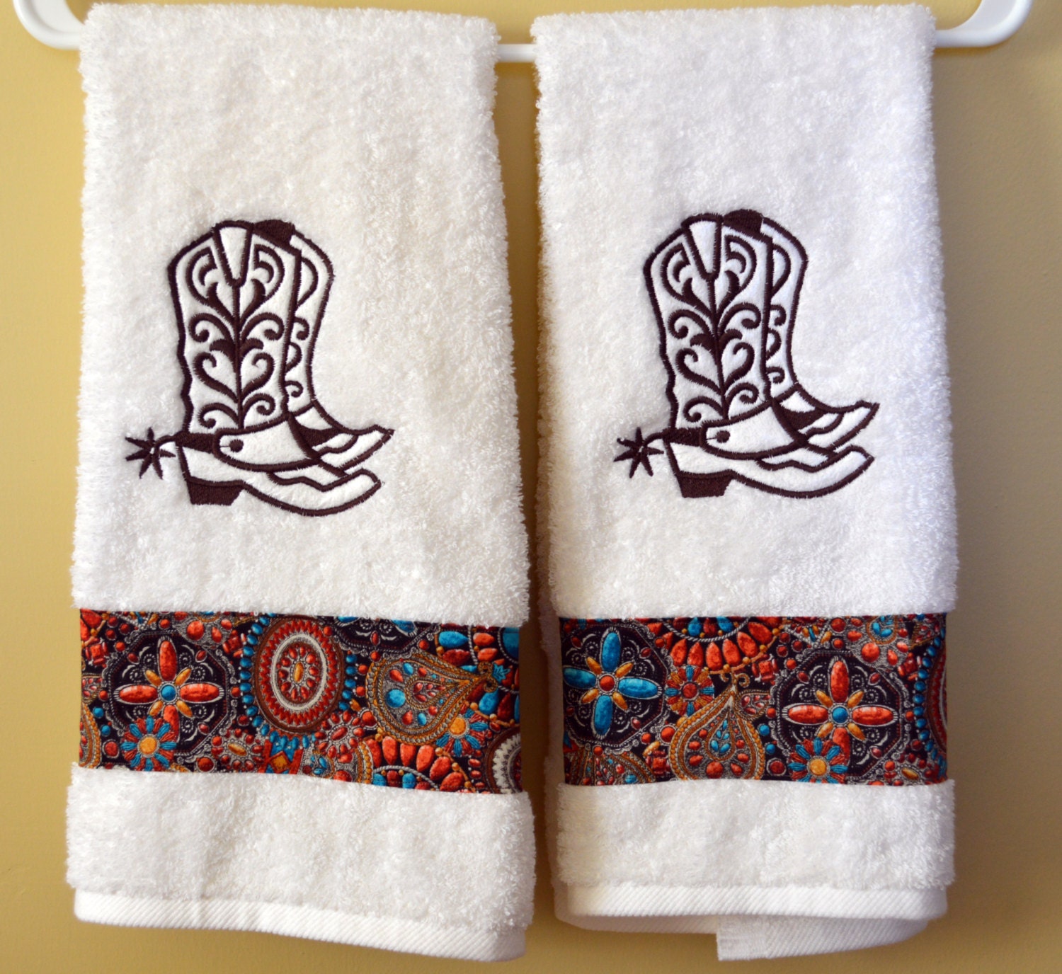 Set of two bathroom hand towels embroidered Boot embellished