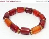 Handcrafted red Carnellian stretch bracelet,oranges, reds,rust and browns, the sunset is in this bracelet,semi precious gemstones,Leo Virgo