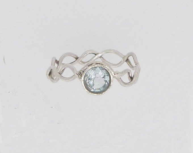 Blue Topaz and Sterling Silver Ring