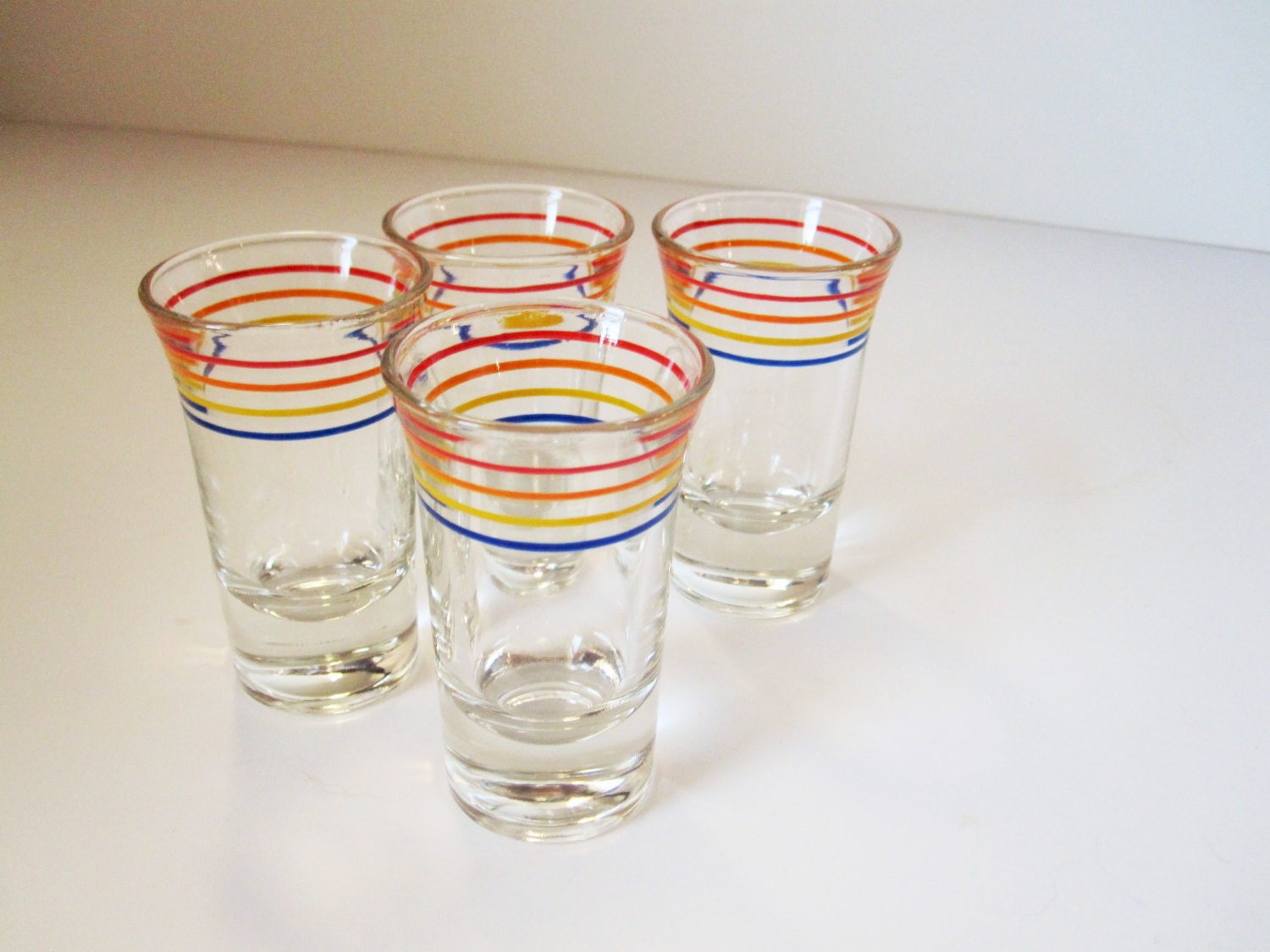 Four Shot Glasses With Red, Orange, Yellow And Blue Stripes – So ’50s 