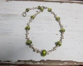 Branching out. Bitter green artisan lamp work with fine silver twigs necklace. OOAK. Hand made by ladeDAH!