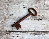 oversize cast iron key to open and close hearts. oversize cast iron key to open and close hearts.