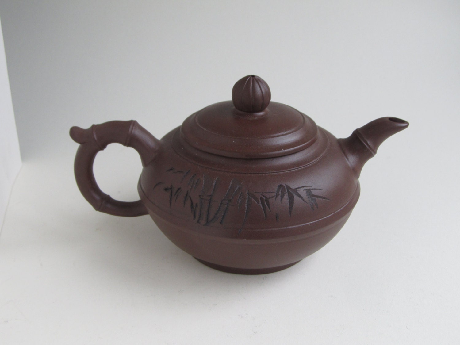 Purple clay Yixing teapot calligraphy and bamboo grove