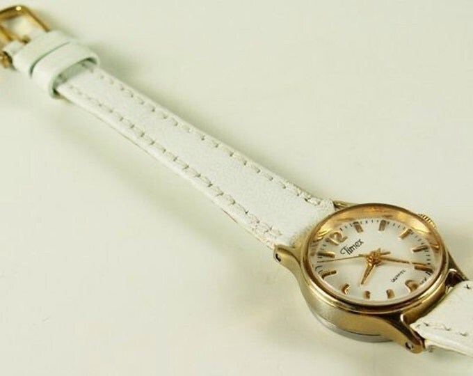 Storewide 25% Off SALE Vintage Gold Tone Bezel Quartz Designer Timex Wrist Watch Featuring White Face With Original White Leather Band