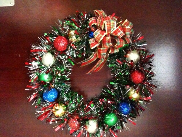 SALE - Ropes of tinsel, wrapped around a wire circle, make a fun, modern wreath that you can use year after year.