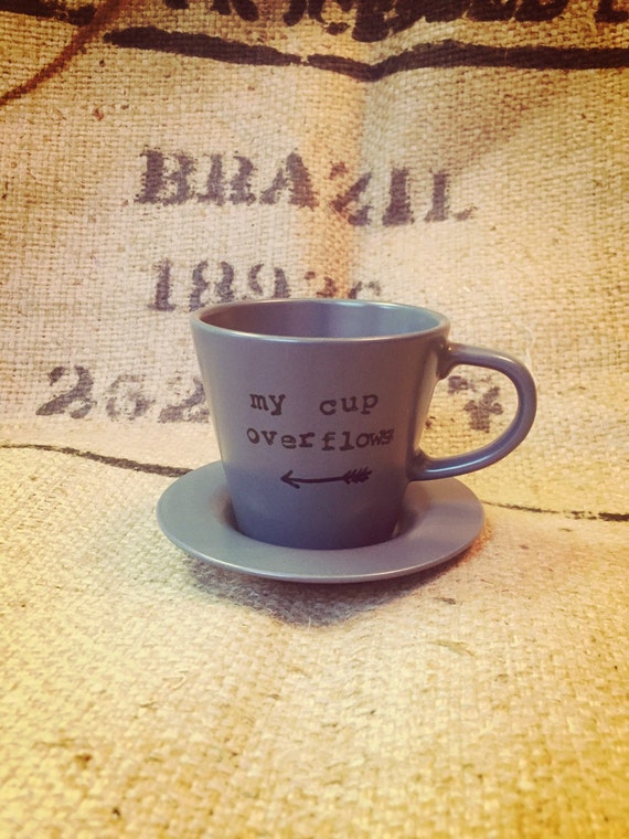 My cup overflows ESPRESSO cup and saucer