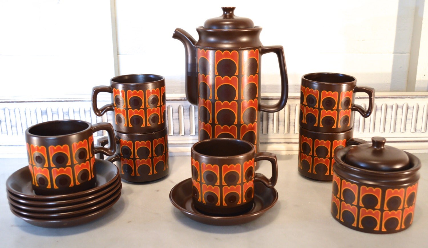 1960s retro coffee set in brown, orange and red Haute Juice