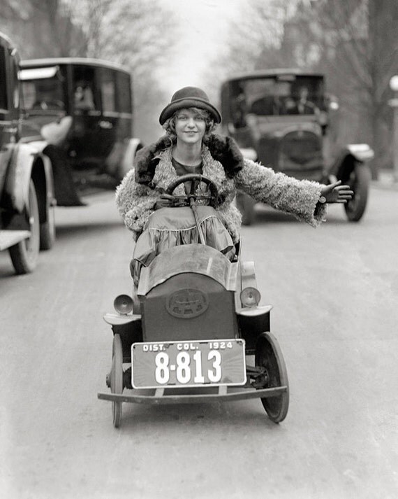 Flapper Driving Pedal Car 1924. Vintage Photo by HistoryPhoto