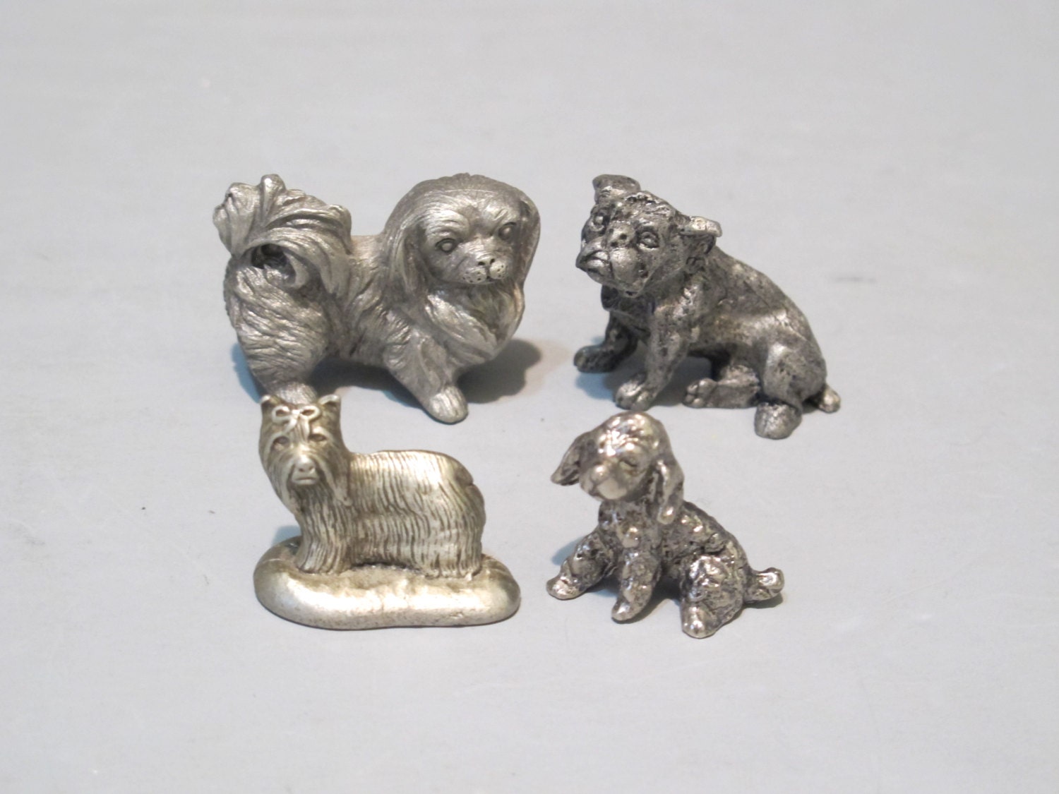 tiny pewter figurines