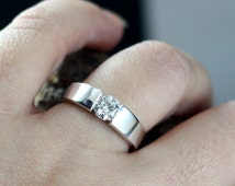 Modern tension engagement rings