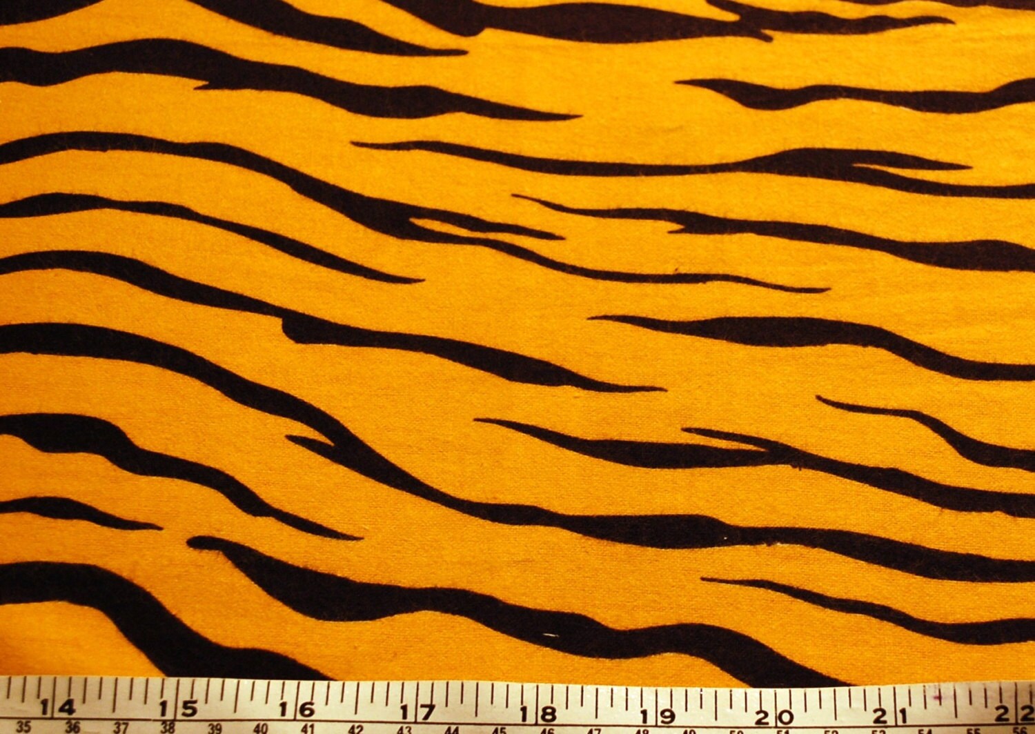 Tiger Print Black and Gold Flannel Fabric Sold by the 1/2 Yard from