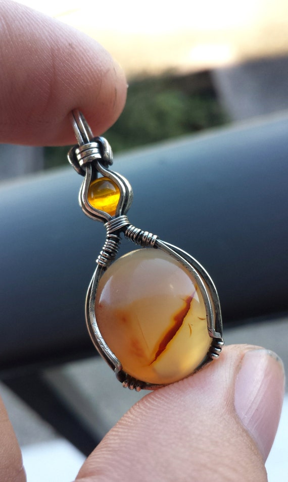 Natural agate & baltic amber wire wrapped by andrewavairedesigns