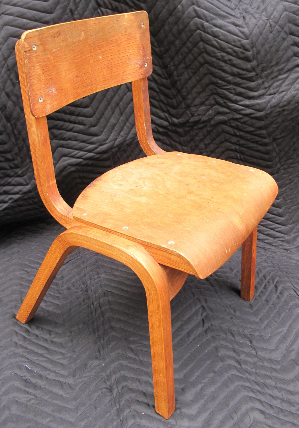 Plywood stacking child’s chair designed by Eric Lyons for Tecta Haute