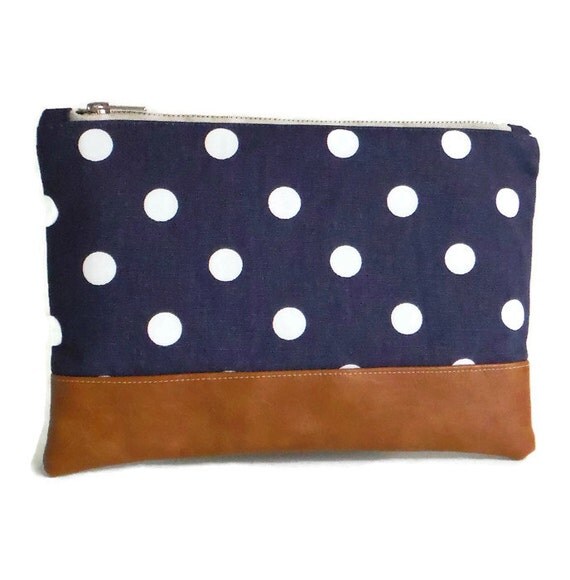 navy and white polka dot clutch bag