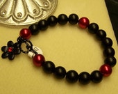 CLEARANCE - Matte Black And Red Glass Pearl Bracelet CLEARANCE - Matte Black And Red Glass Pearl Bracelet