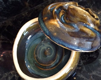 This is a beautiflul lidded ceramic jar