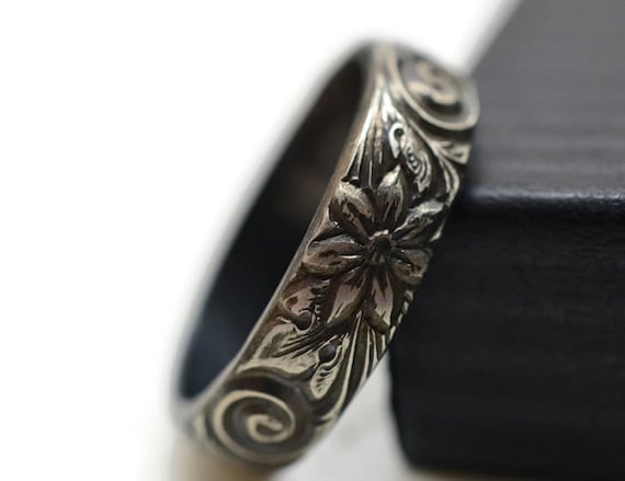 Floral engraved engagement rings