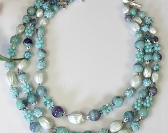 Items similar to Retro Aqua Fan Necklace on Etsy