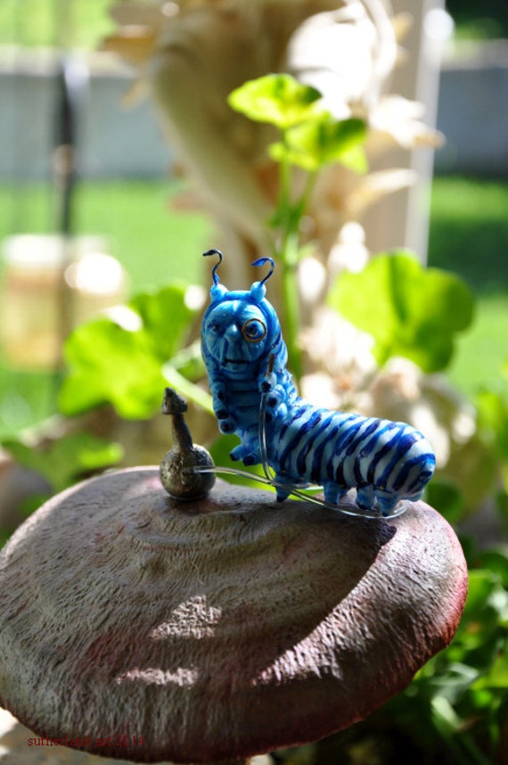 alice in wonderland caterpillar statue