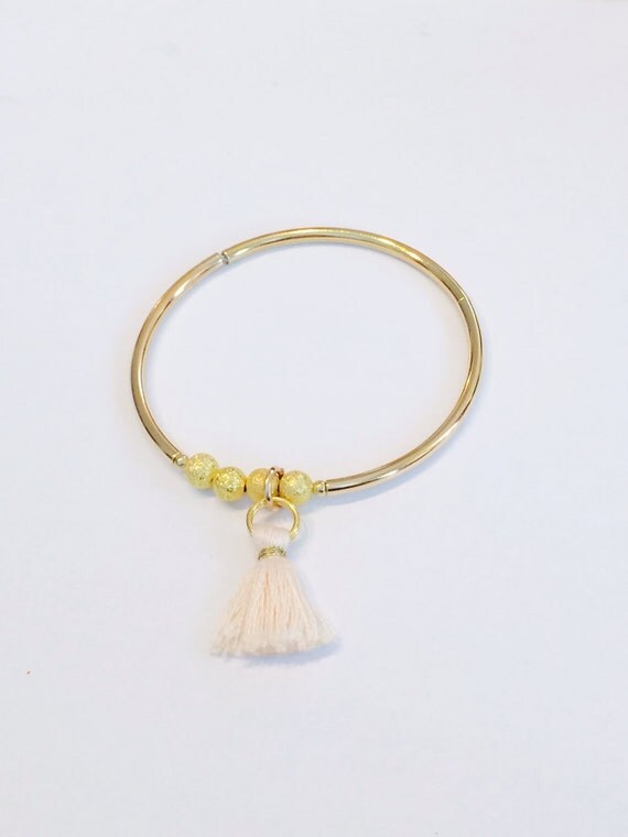 Items similar to Gold Stretch Tassel Bangle Bracelet on Etsy