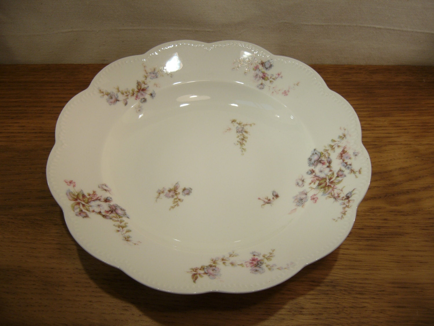 Antique 1910s Frank Haviland Limoges porcelain soup plate with