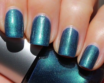 Kiss the Girl Franken Nail Polish - Dark blue slightly teal with green highlights