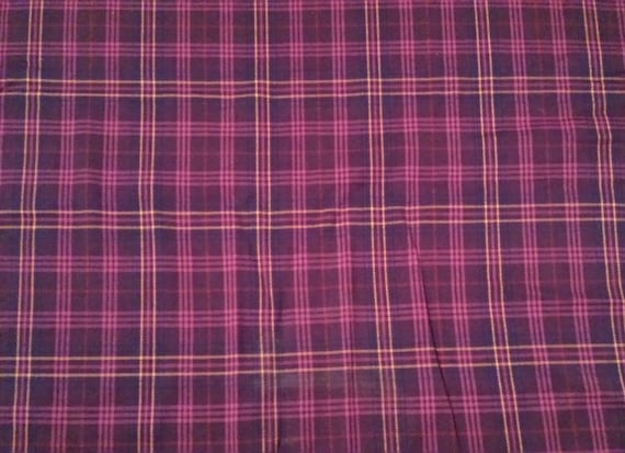 Purple and yellow plaid suiting fabric