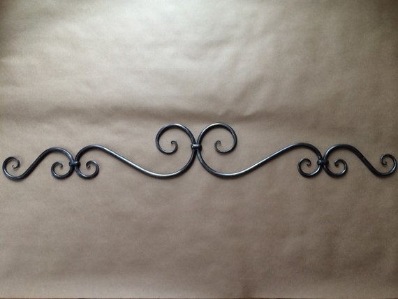 Wrought iron wall art, doorway scroll