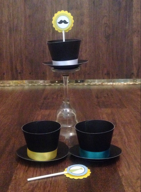 Items similar to Little man top hat cupcake wrappers (12) on Etsy