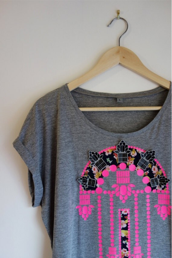 Embellished Women's TSHIRT with a bold fluoro pink vinyl