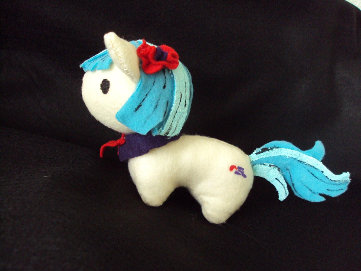 coco pommel plush