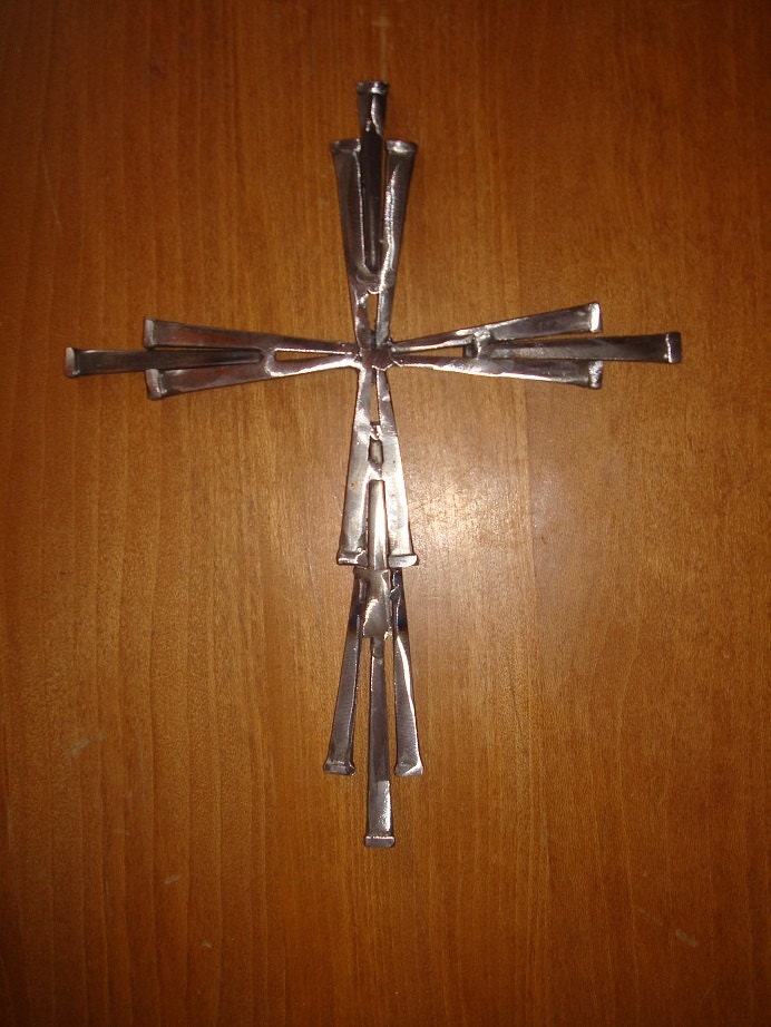 Cross made out of masonry nails. by RusticAttitude on Etsy