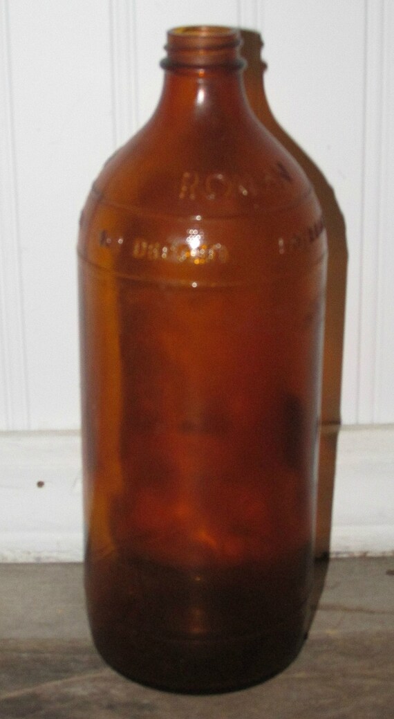 Vintage Amber Glass Roman Cleanser Bottle