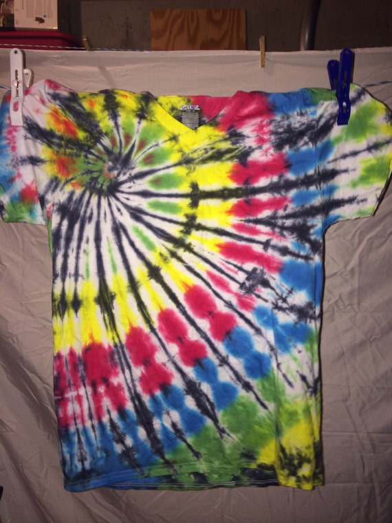 Green yellow blue and red tie dye shirt. by AllTieDyeEverything