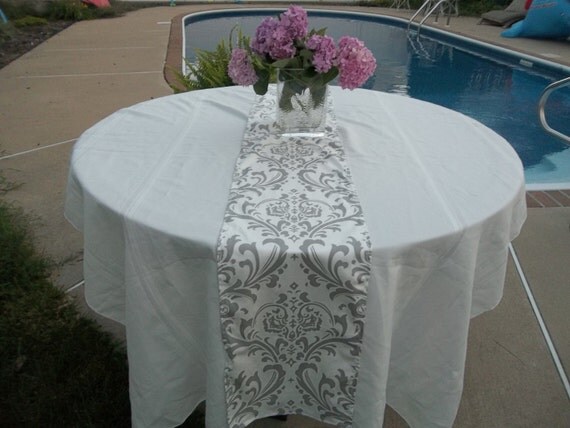 White gray table aand runners gray runners  table damak