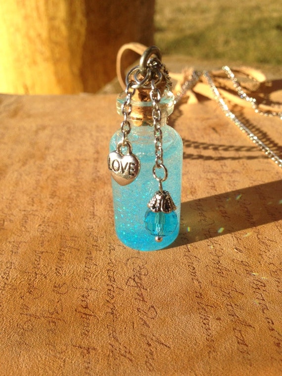 Items similar to Blue Glimmer, Tiny Bottle Necklace, Small Vial with