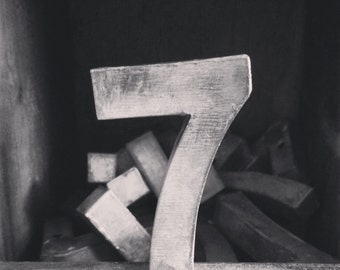 Square Black And White Print Of A Vintage Antique Metal Number 7