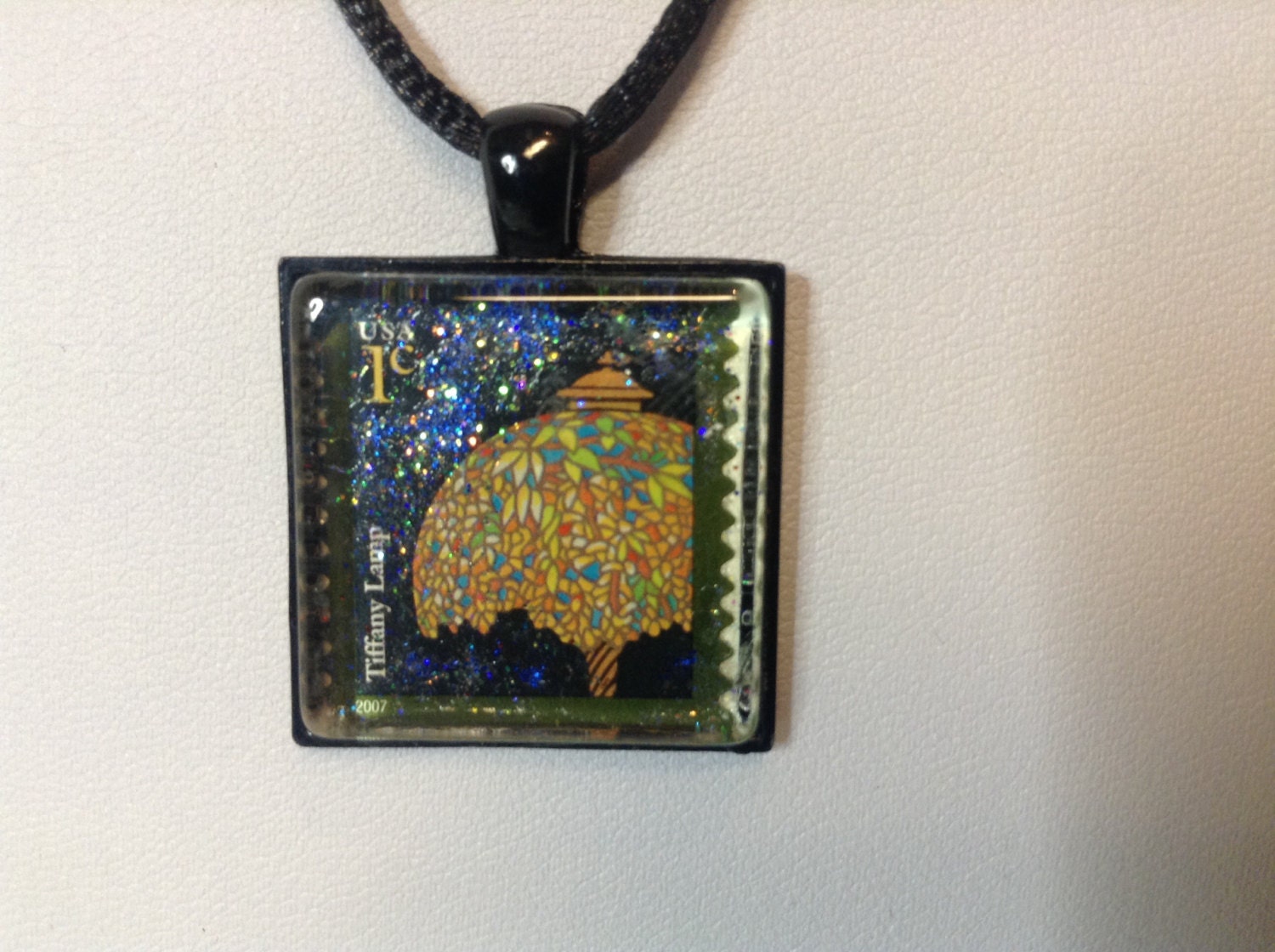 Tiffany A USA 1 cent postage stamp featuring a Tiffany Lamp