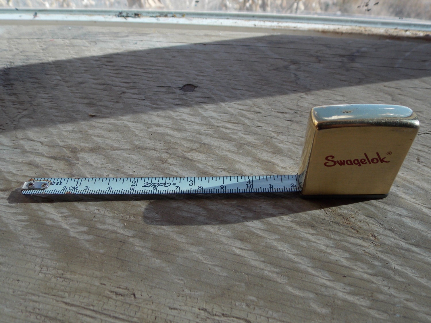 Vintage Swagelok Zippo measuring tape