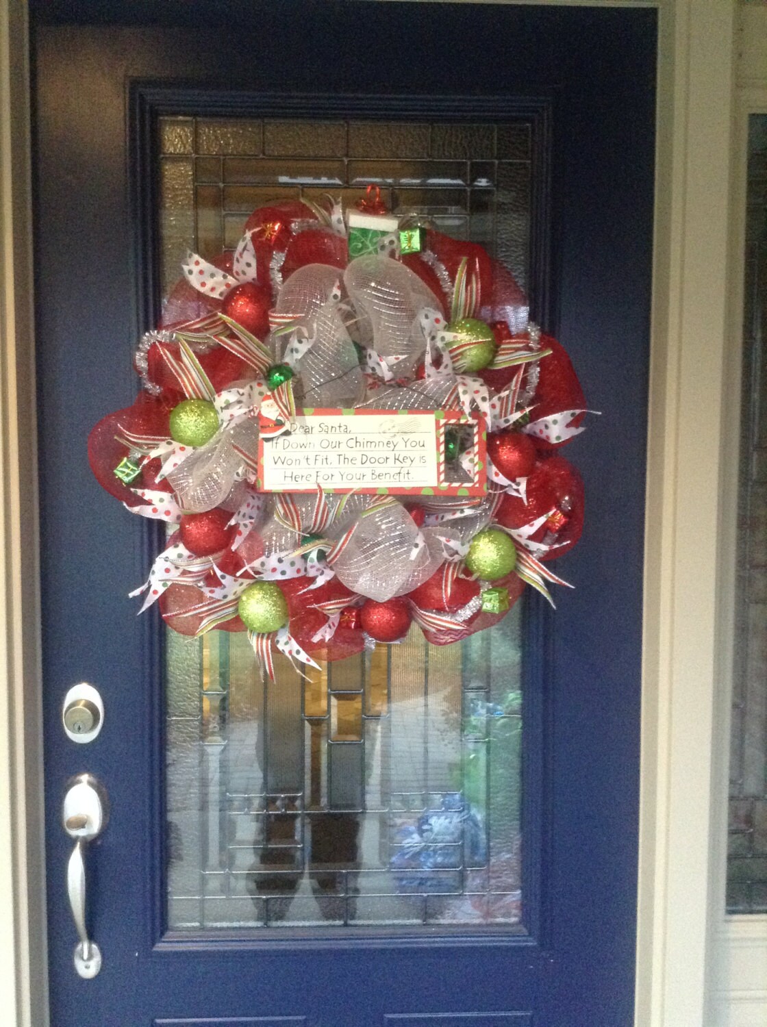 Red and Silver deco mesh Christmas wreath perfect for apartments, condos or homes without chimneys