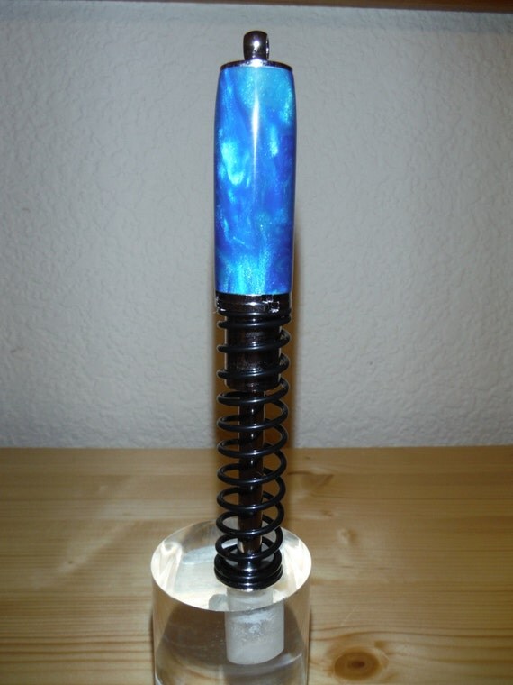 Custom made pen cap of polymer clay that adds a distinct flair