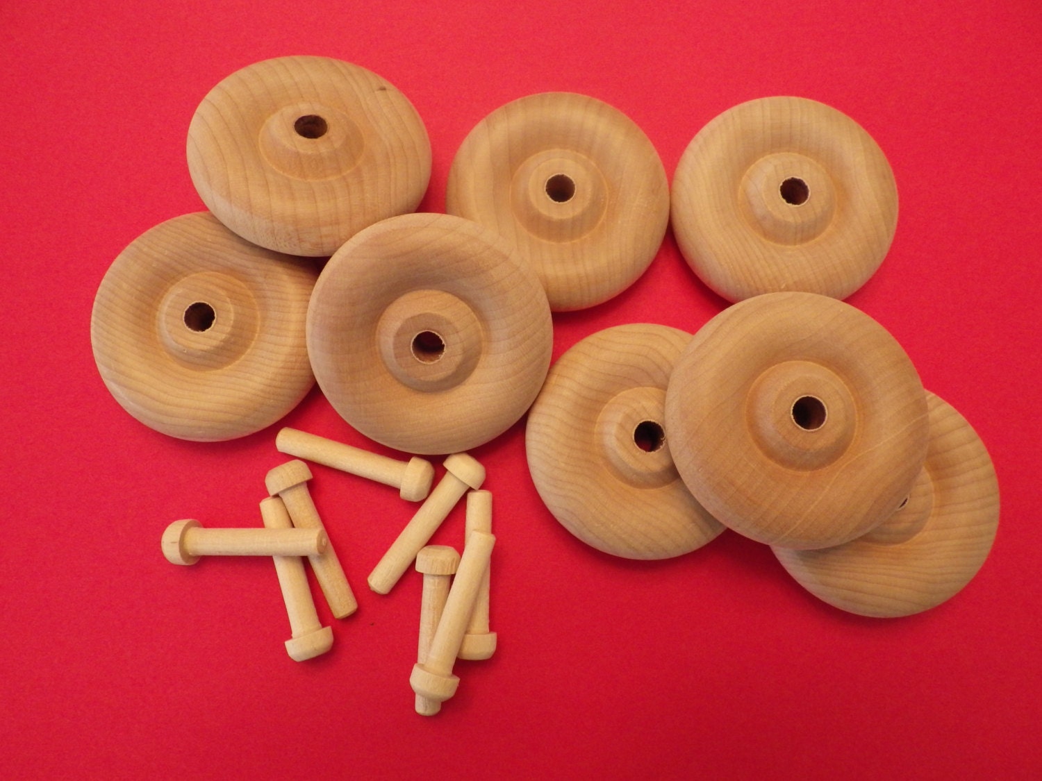 8 Toy Wood Wheels and Axle Pegs from LucyandPearlsPlace on Etsy Studio