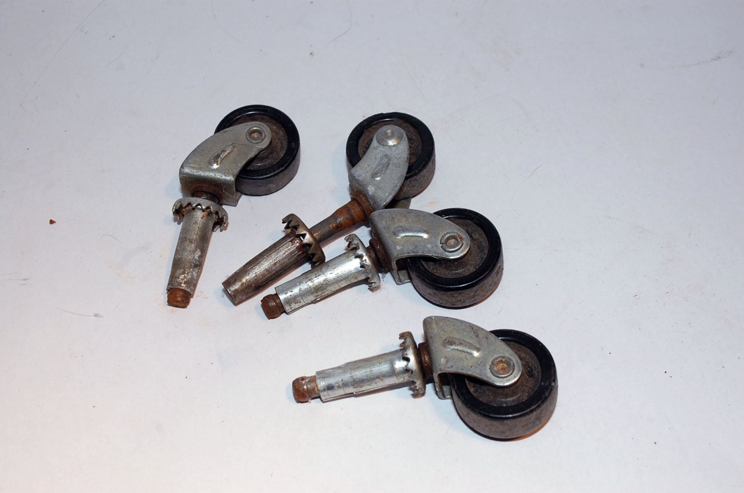 4 small vintage casters feet legs table rolling wheels rotating swivel