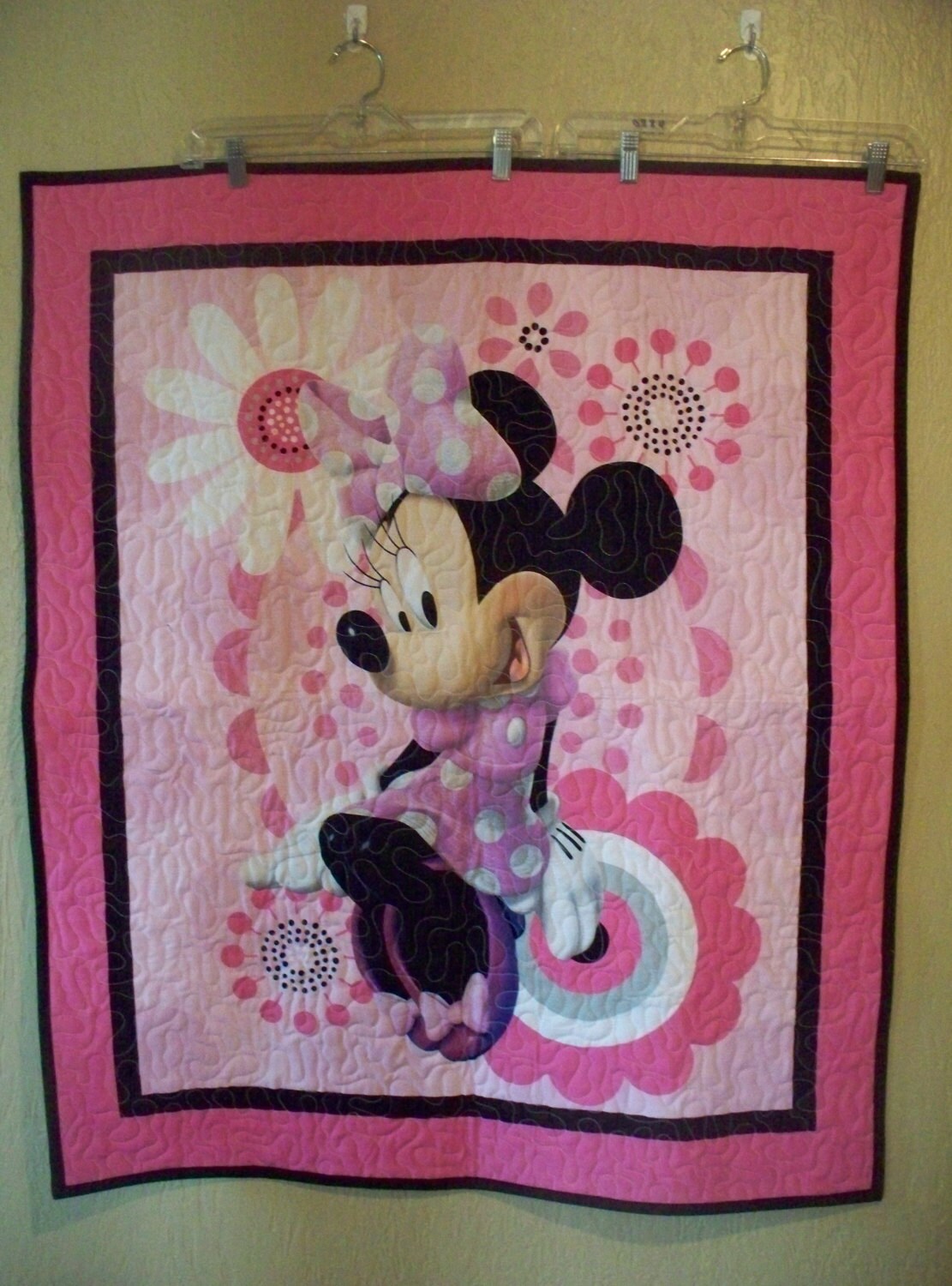 503.Baby quilt of MInnie Mouse panel has been machined