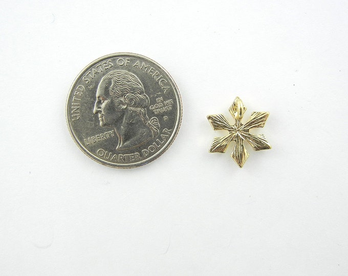 Tiny Rhinestone Accented Gold-tone Snowflake Pendant
