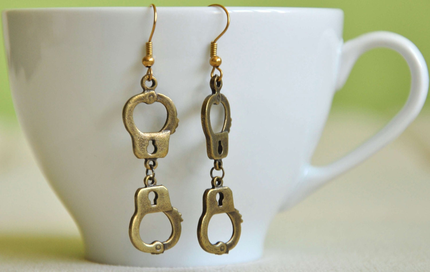 handcuffs earrings hand cuff earrings bronze by LoriennaDesigns