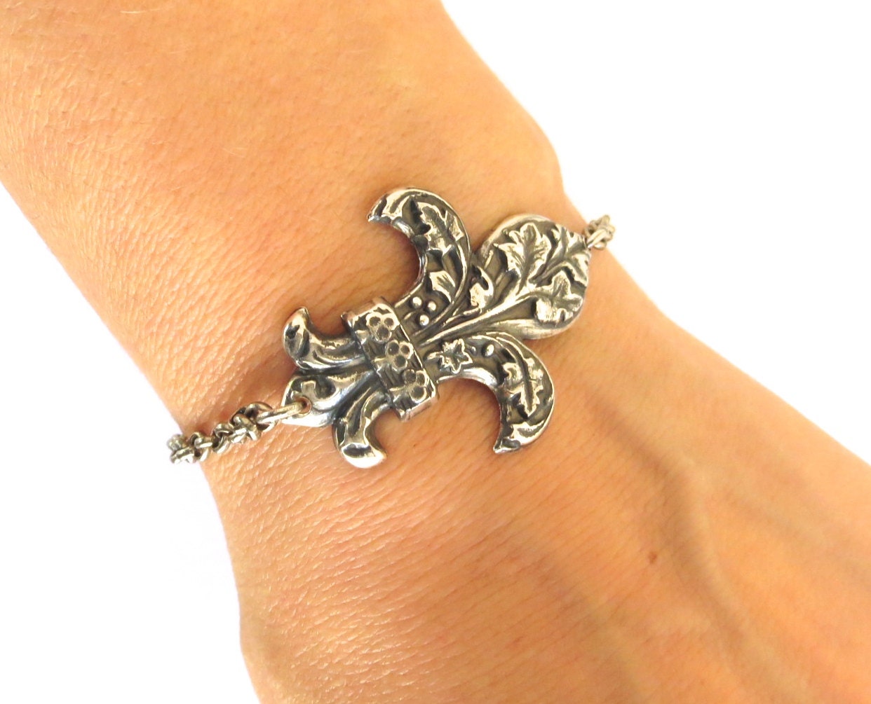 Fleur de lis charm bracelet Clearance