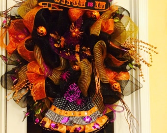 Items similar to Halloween Holiday Witch Wreath - Made with Black and ...