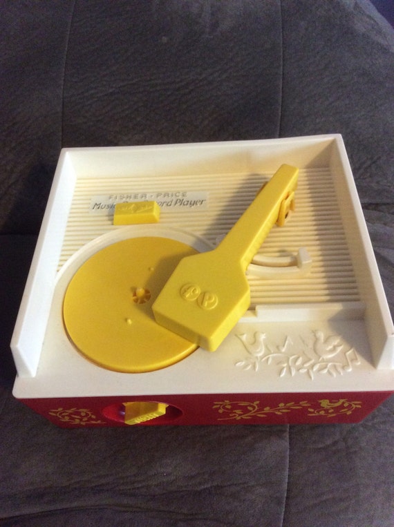 fisher price record player with 5 records